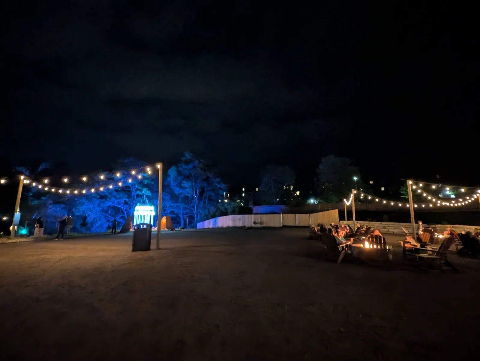 String lights and fire pits outside Aquavia Lumina