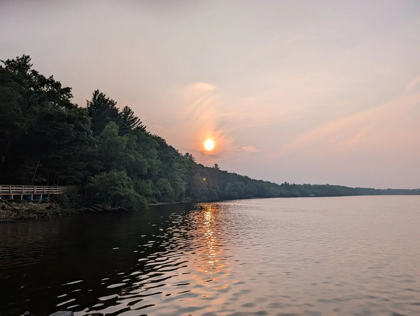 The sun setting over the Wisconsin River from the boat