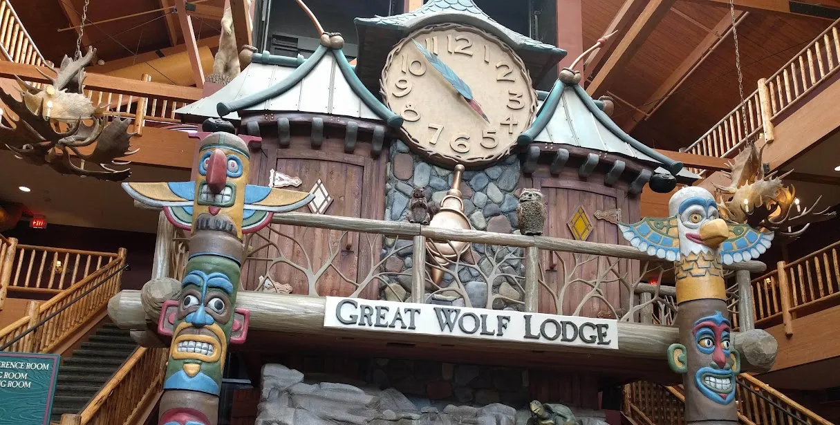 The Great Clock Tower with totem poles in the lobby of Great Wolf Lodge in Wisconsin Dells
