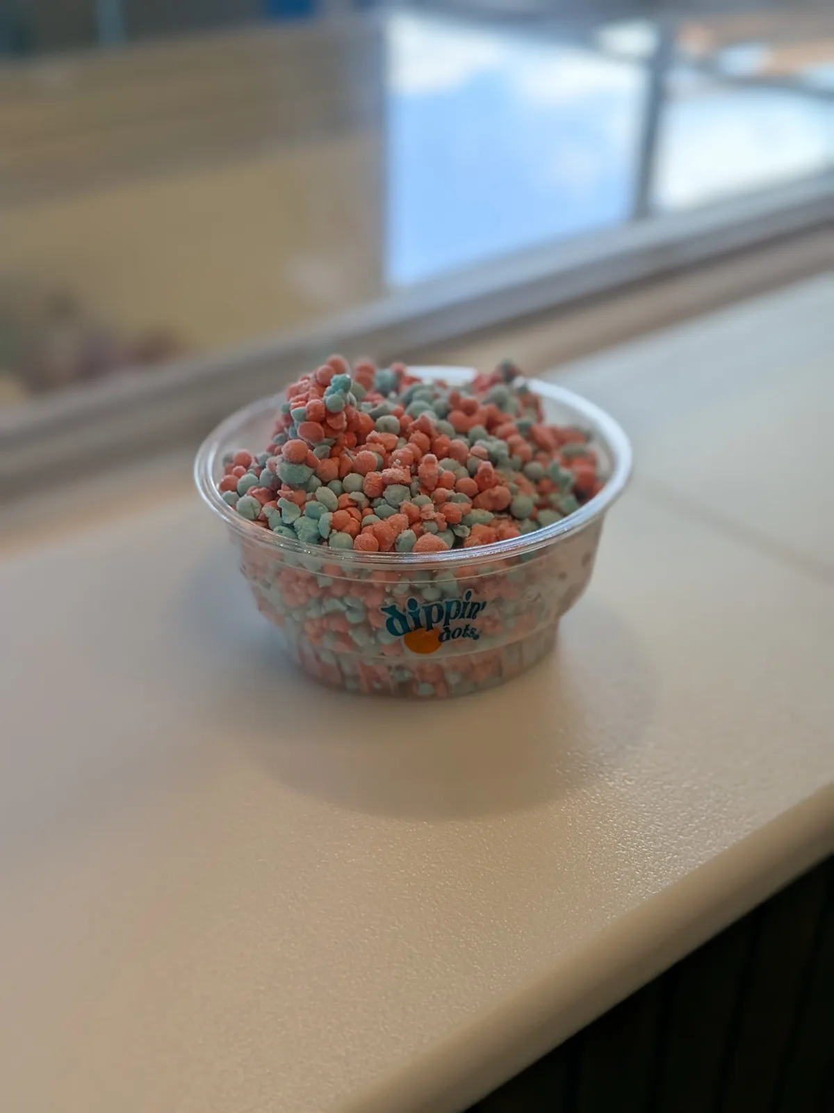 A cup of ice cream with sprinkles at Land of Natura