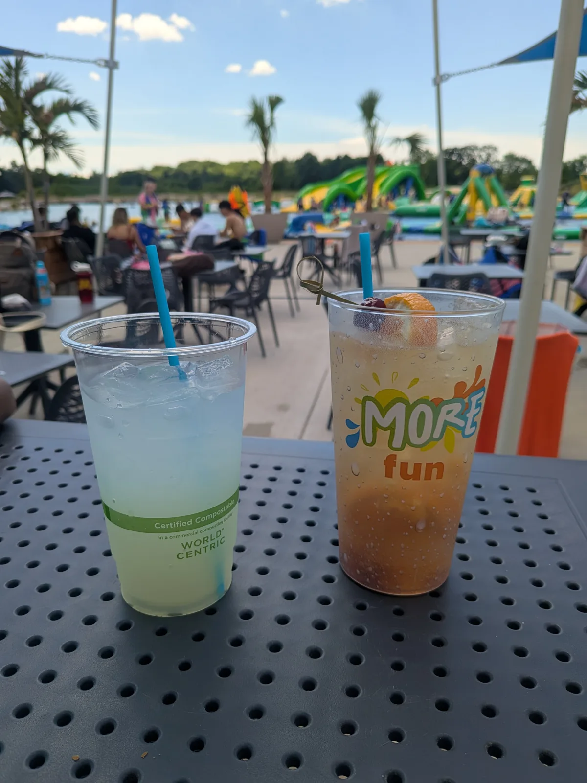 A lemonade and a fruit drink on a table by the beach at Land of Natura