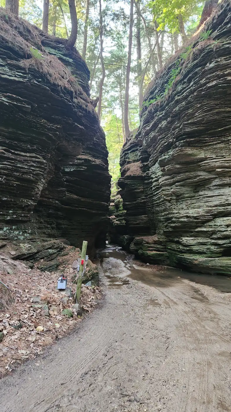 A narrow passage between sandstone walls at Lost Canyon