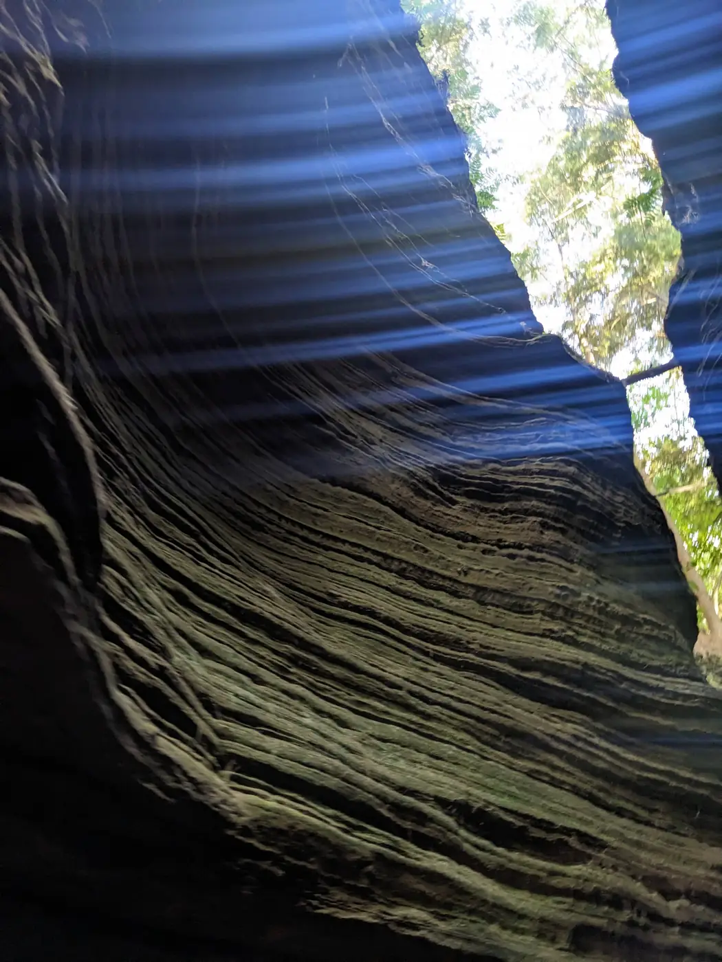 Light filtering into a slot of the canyon