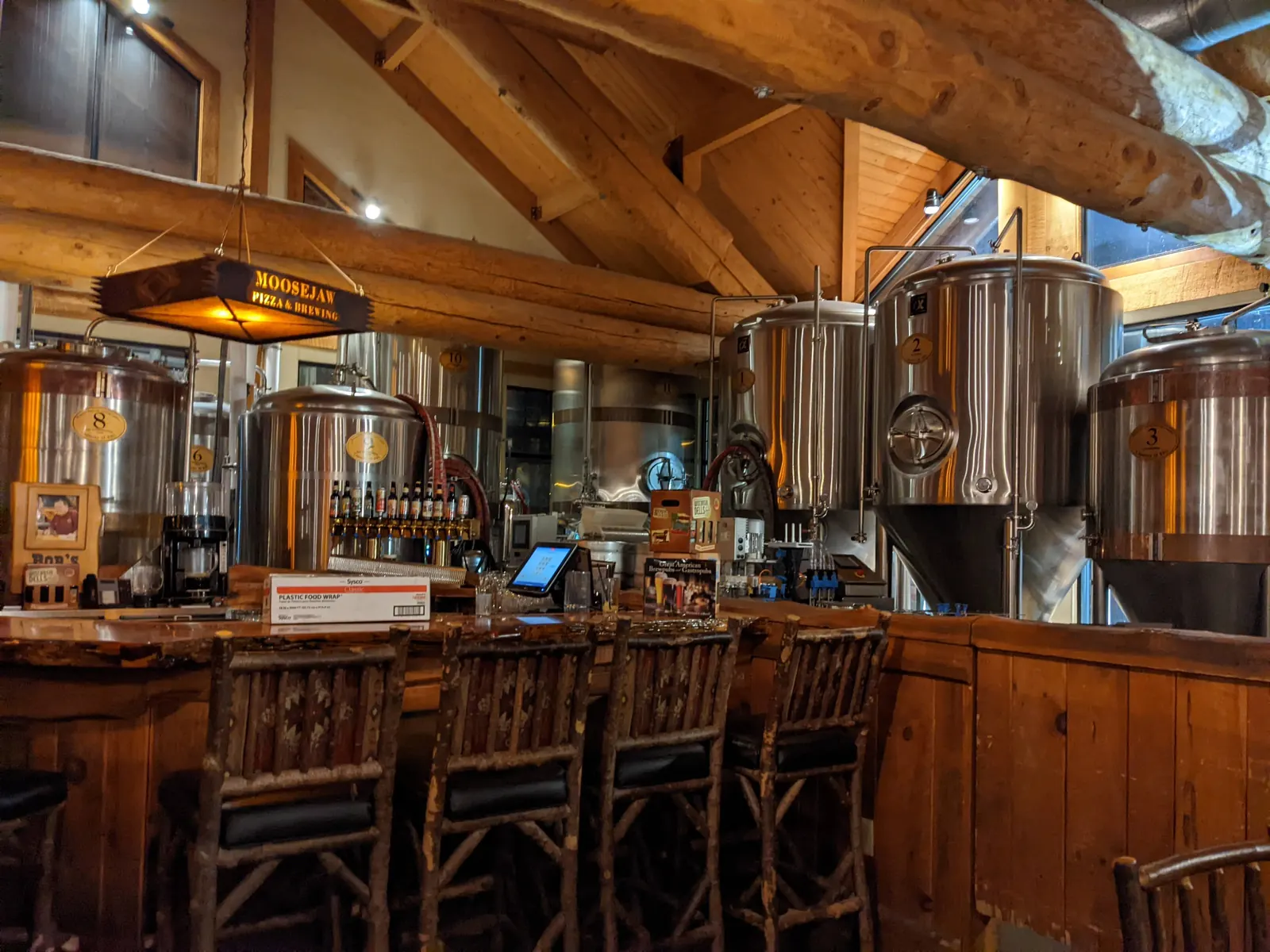 The brewing tanks behind the bar at Moosejaw Pizza & Dells Brewing Co.