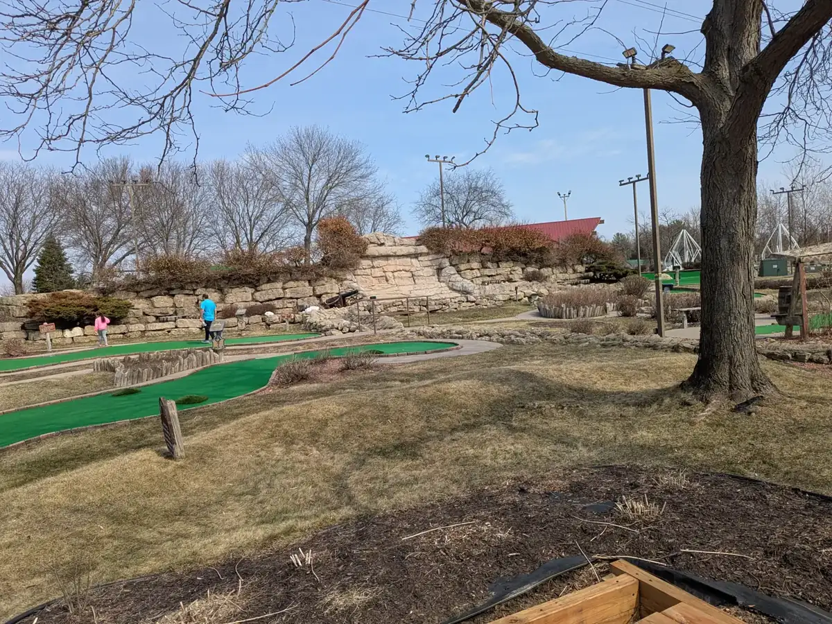 A rock hillside with pirate-themed holes at Pirate's Cove