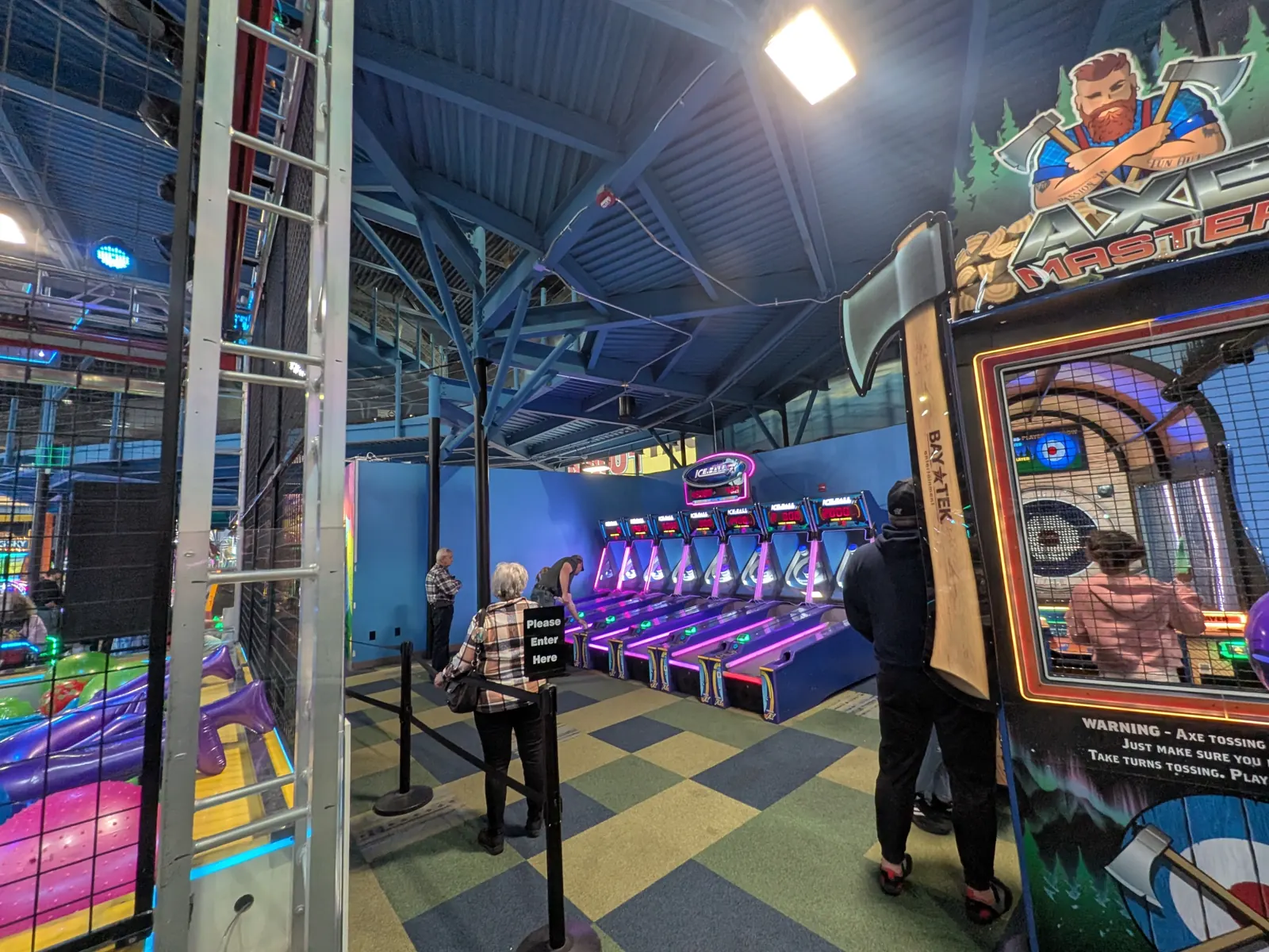 Rows of arcade games at Tom Foolery's