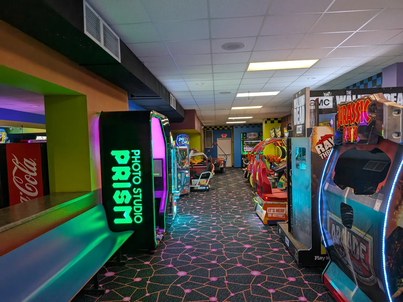 An aisle of arcade games at Wild Fun Zone