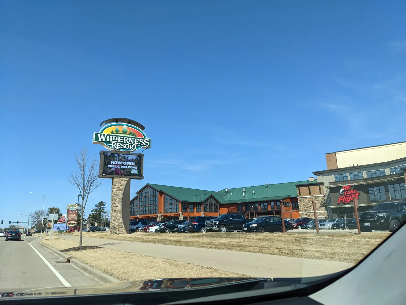 The Wilderness Resort sign on the drive in